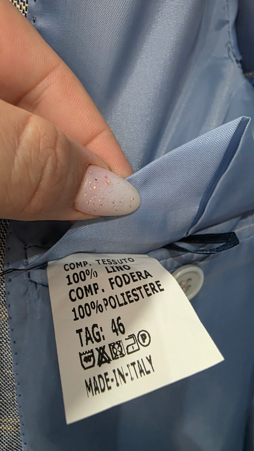 Etichetta composizione 100% lino, fodera 100% poliestere, taglia 46, Made in Italy