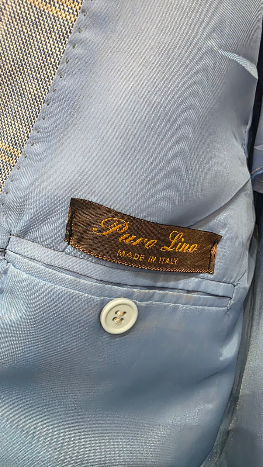 Etichetta Puro Lino Made in Italy e fodera azzurra