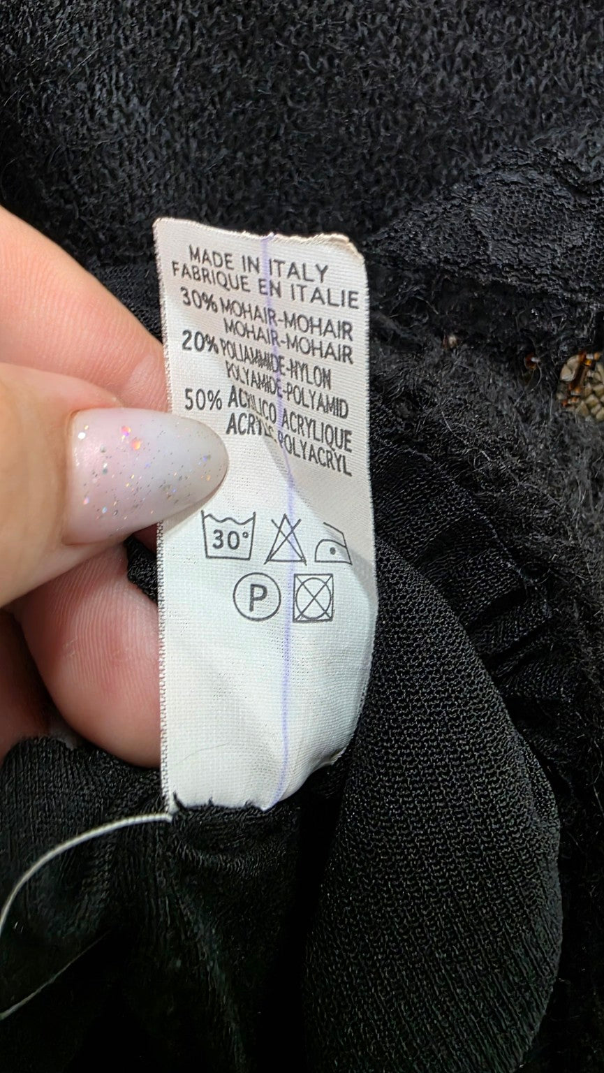 Etichetta Made in Italy: 30% mohair, 20% poliammide, 50% acrilico