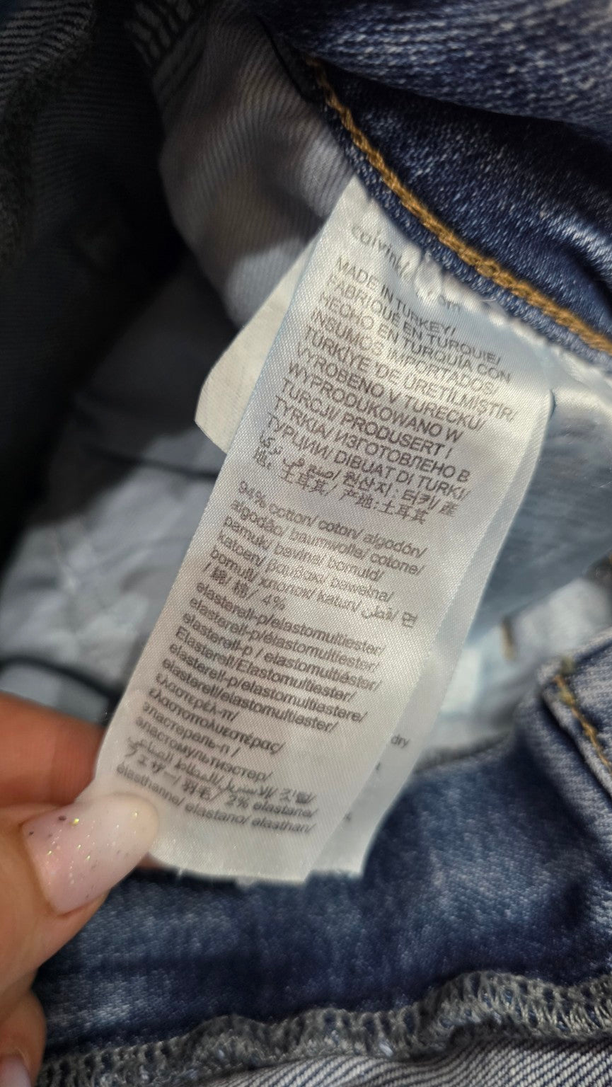 Etichetta composizione dei jeans Calvin Klein