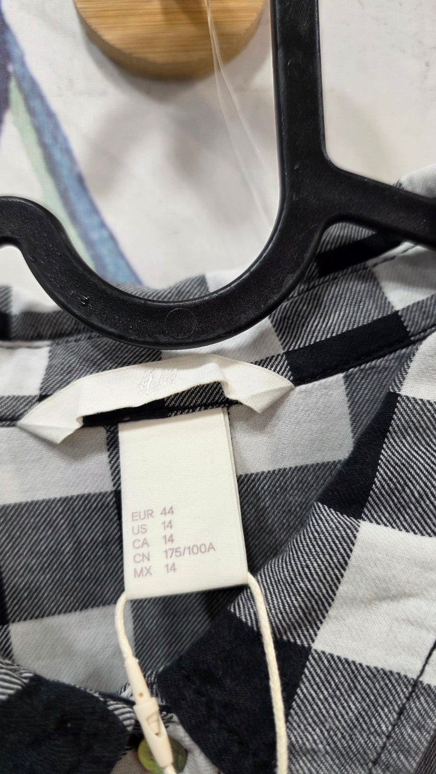 Etichetta originale della camicia H&M taglia EUR 44