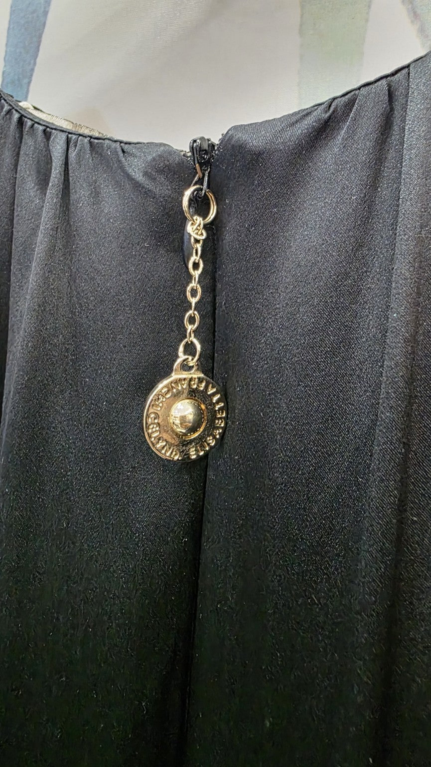 Pendente metallico della zip posteriore originale