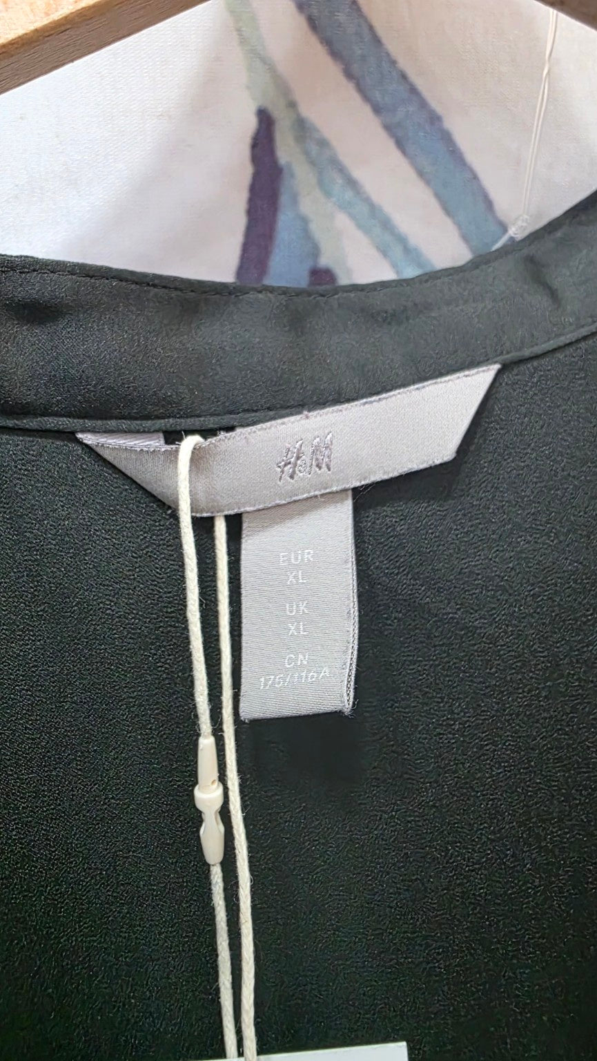 Etichetta H&M taglia XL