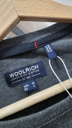 Etichetta brand Woolrich, taglia USA M EU L